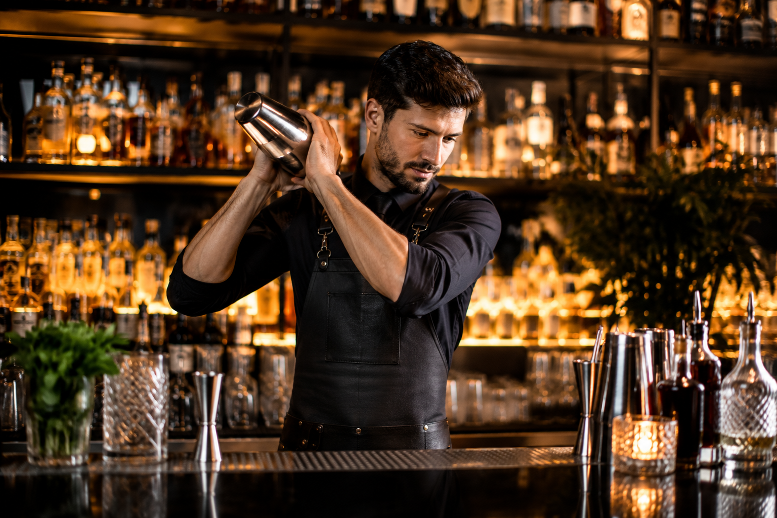 Bartender shaking a craft cocktail